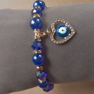 Evil Eye Blue and Gold Stretch Beaded Bracelet with Charm